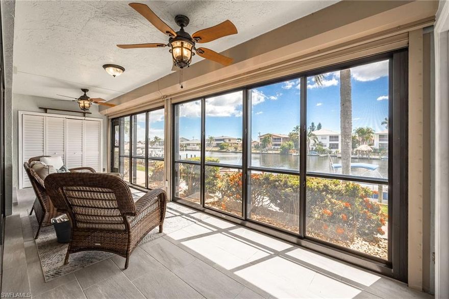 Waterfront sunsets are calling—don’t miss this move-in-ready 1st-floor condo on the highly sought-after Rubicon Canal. This beautifully updated 2-bedroom, 2-bath residence offers a completely renovated kitchen with white Craftsman-style cabinetry, granite countertops, and oversized natural tile flooring throughout, creating a bright, clean, and modern coastal feel.

The spacious living room opens with quad sliders to an expansive lanai measuring over 25 feet across—seamlessly blending indoor and outdoor living and drawing your eye straight to the water. This is where you’ll start and end your day, taking in wide canal views and stunning southwest Florida sunsets. A dedicated dining area adds flexibility for everyday living or entertaining.

The primary suite features sliding glass doors to the lanai, enhancing that easy indoor-outdoor flow, while both bathrooms have been fully remodeled and offer walk-in showers for added comfort and convenience.

The oversized lanai is designed for true year-round enjoyment with electric hurricane shutters and clear vinyl enclosures, allowing you to relax in comfort while enjoying the view in every season.

Located in Rubicon Vista, a highly desirable 55+ waterfront community, residents enjoy a heated pool, canal-front boat docks (first come, first served), and convenient storage for all your beach and boating essentials. No pets allowed. Additional features include a washer and dryer setup, assigned carport parking, and easy access to waterfront living. Move right in and start enjoying the Florida lifestyle.

Tucked into a quiet residential neighborhood, this location offers the ideal blend of privacy and accessibility. Boating access is available first-come, first-served (no lifts). Offered furnished/turnkey if desired, making this an easy move-in or seasonal retreat.

Opportunities like this on the Rubicon Canal don’t last—schedule your showing and bring your offer.