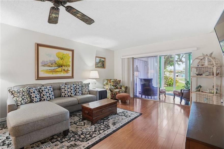 Welcome to a FIRST FLOOR and partially furnished - versatile Naples retreat perfectly suited for year-round living or seasonal winter escape. Ideally located just minutes from the Gulf beaches, 5th Avenue South, and Naples’ renowned dining and shopping, this FIRST-FLOOR CORNER CONDO offers comfort, convenience, and relaxed coastal living.  This 2BR/2BA residence features 1,100 square feet of well-designed living space, enhanced by new windows and sliding glass door that bring in natural light while adding peace of mind.  UPDATED FLOORING throughout provides a clean, neutral backdrop—Step onto the screened lanai overlooking a PEACEFUL WATERWAY, where sun-filled days, gentle breezes, and bird-watching create a calming outdoor retreat—perfect for morning coffee or unwinding after a sunny beach day...Inside, the layout offers privacy and flexibility. The primary bedroom suite includes an oversized closet and ensuite bath with shower, while the guest bedroom suite, complete with its own full bath and pocket door, is ideal for visiting guests, a home office, or extended stays.
Additional highlights include a COVERED CARPORT, SPARKLING COMMUNITY POOL, and CABLE & INTERNET included in the quarterly condo fee.... Whether you’re seeking a full-time Naples home, a lock-and-leave second residence, or a smart investment, this condo delivers an exceptional blend of location, lifestyle, and potential.
55+ Community.  Buyer to verify all information.