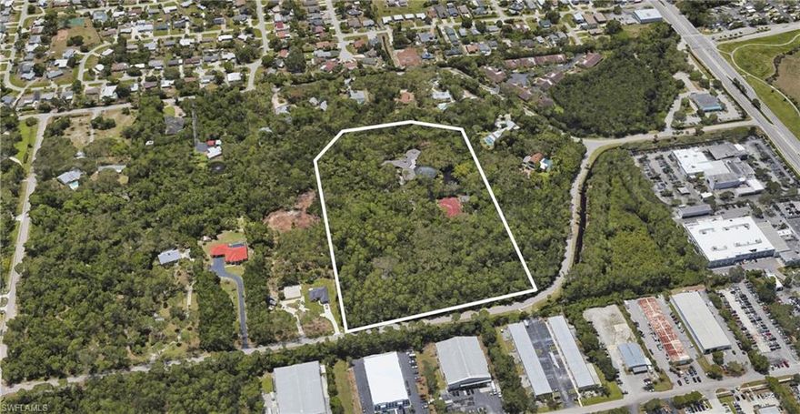 This 12-acre property presents a rare opportunity for investors, developers, or end users seeking usable acreage close to downtown Naples and the airport. With Estate zoning (“E”) already in place, the land is ideal for creating five well-sized parcels or two large estate lots, each with ample room for car barns, warehouse-style storage, hobby shops, RV or boat garages, and other “toy-friendly” outbuildings. 

The setting is quiet and private, making it an excellent fit for a small, exclusive estate community or for buyers looking to build expansive compounds with both lifestyle and functional space. Existing improvements include a 1980 A. Vernon Allen–built home, along with a tennis house and court positioned around a pond and footbridge. These structures can remain or be removed depending on the desired direction of the project. 

With its size, zoning, and prime location, the property is straightforward to plan and develop - whether the vision is five premium homesites, two signature estates, or another low-density concept. Higher-density possibilities also exist under current zoning, offering added flexibility for future strategies. 

A true acreage rarity in Naples, offering multiple clear paths for value creation - practical, flexible, and ready for its next chapter.