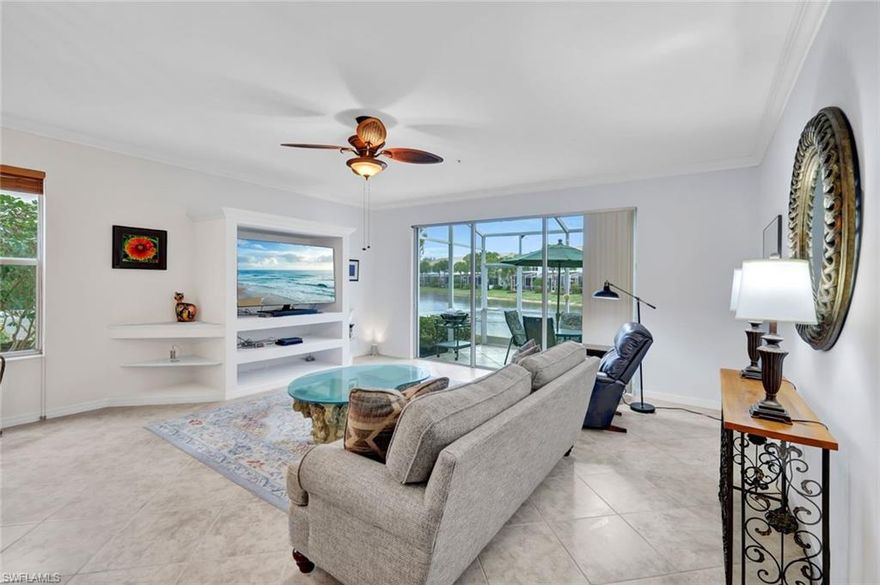 RARELY AVAILABLE END UNIT WITH 2 CAR GARAGE!  This clean, bright, and well-maintained end unit comes with 3 bedrooms, 2 1/2 baths, 2-car garage and views of the lake.  As an end unit, it has a beautiful open walkway to the side front door and has numerous side windows to allow for natural light to come in. The great room comes with a built-in for your TV as well as side shelves for display or storage. There is also a laundry in residence with washer/dryer on the second floor where all bedrooms are located.  Milano is a popular North Naples community with low fees, close to new Seed-to-Table, A-rated schools, as well as beaches and many other shopping/entertainment areas.