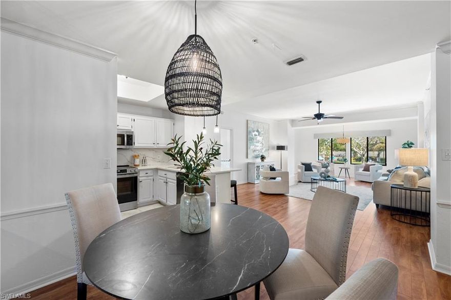 WATER VIEWS. TWO SCREENED TERRACES. BRAND NEW APPLIANCES. NO POPCORN CEILINGS. ONE CAR GARAGE. Welcome to where Naples elegance meets daily ease and “senior living” means spa days, sunset socials, and fun activities or relaxing at home. This updated 3BD/2.5BA condo is tucked into the heart of Arbor Trace, across from the heated community pool, spa and bocce. This amenity-rich community allows you or your loved one(s) to live independently while keeping help close at hand. 

Step inside and you’ll notice how effortlessly style meets substance. The kitchen boasts brand new GE matching stainless steel appliances, fantastic quartz countertops with a slab backsplash and classic white cabinetry. Whether you’re whipping up an actual meal or arranging cheese and crackers with flair, this space is designed to make you look good doing it. The open concept layout flows into a sun-drenched living and dining area with large windows offering calming views of the lake and lush landscaping. 

The primary suite is its own private escape, featuring a generous walk-in closet and an en suite bathroom that’s both stylish and accessible. The newly installed carpeting is plush and cozy in the bedrooms. The guest bedroom and bath are thoughtfully placed on the opposite side of the unit for privacy, making hosting out-of-town visitors a joy (or at least tolerable, depending on the visitors). A full-size in-unit laundry room and one-car detached garage check the final boxes for practical, no-hassle living.

But let’s be clear: Arbor Trace isn’t just a place to live. It’s a place to live well. As one of Naples’ only 100% equity-owned senior communities with optional on-site assisted living, Arbor Trace combines the freedom of homeownership with the peace of mind that support is there if ever needed. This is independent living with backup—just the way it should be.

Amenities include restaurant-style dining, a heated pool and spa, a fully equipped fitness center, and even a private movie theater (yes, really). There’s also a library, beauty salon, wellness clinic, and a jam-packed social calendar offering everything from lectures and game nights to bocce, pickleball, and themed parties you may or may not remember the next day. Residents enjoy scheduled transportation, emergency response systems in every unit, and access to Arbor Glen, the on-site licensed assisted living facility. 

HOA Fees - Condo $2,424/month and covers: management, repairs and maintenance to property, common area furniture and fixtures, water, sewer, trash removal, electric, recycling, pest control, cable, wi-fi, insurance and reserves. Club membership is $1,820/month (single) or $2,420/month (double) club facilities, fine dining (120 dinners/person annually), scheduled transportation for shopping, medical appointments, and off-site activities, daily shuttle service to the Club for dining, on-site cultural and social events and off-site excursions.

Property has been destaged.