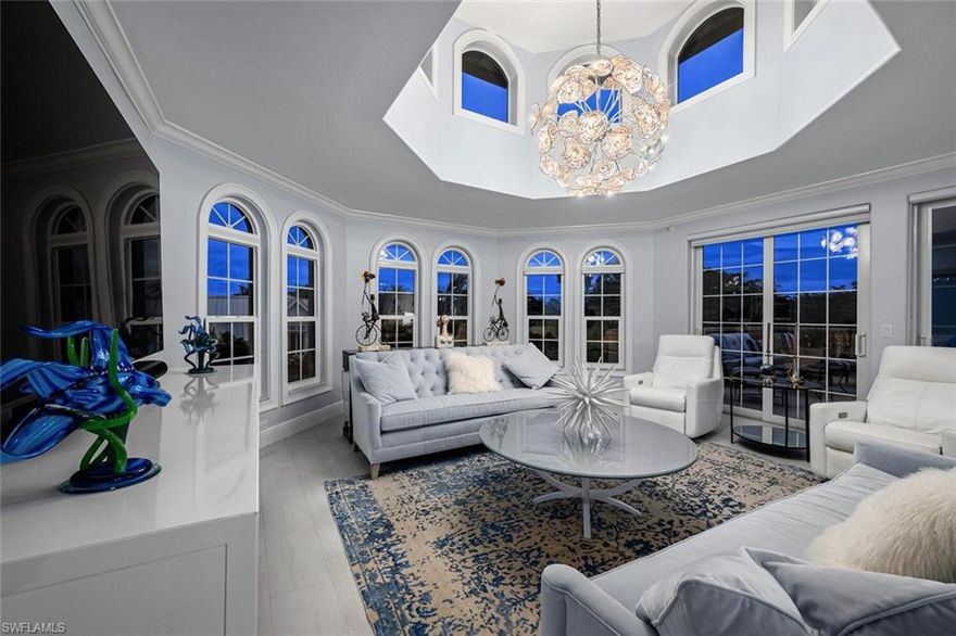 Glamorous Olde Naples Penthouse in boutique complex of 17 residences just one block from 5th Avenue and 4 blocks from Naples Beach. Unique offering of a one-of-a-kind downtown condominium. Over 2700 square feet of impeccably, fully renovated living space. Two private light and bright Lanai spaces for sunrise and sunset. Modern, open floor plan featuring gourmet chef's kitchen, custom cabinetry, Christallo Quartzite counters and backsplash. Additional features include Versace flooring, hand painted Italian porcelain Versace tiled showers. Fine art crystal and Murano glass chandeliers. Stunning foyer with backlit, marble entry pieces creating a striking first impression. Floor plan is receptive to casual as well as formal entertaining, all overlooking a tropical courtyard with two pools and hot tubs.