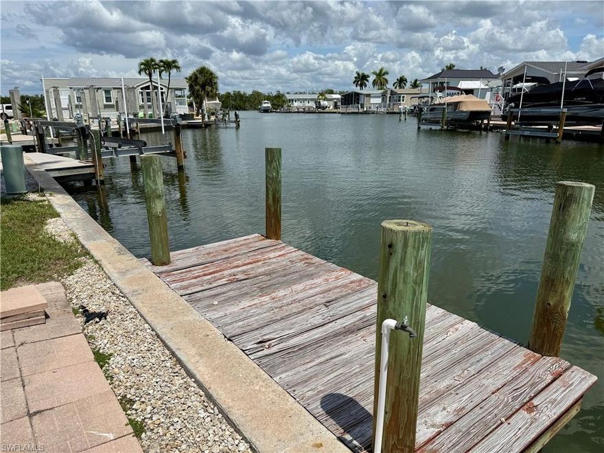 Waterfront vacant lot located at 52 Doubloon Way in Port Carlos Cove. This canal-front property offers Gulf access and provides a great opportunity to build your own coastal retreat in one of the most desirable boating communities near Fort Myers Beach.

Enjoy quick access through the back bay to the Gulf of Mexico for boating, fishing, and island hopping. Port Carlos Cove is a waterfront community known for its relaxed coastal lifestyle and convenient location close to beaches, waterfront dining, marinas, and shopping.

Community amenities include a community pool, clubhouse, boat ramp, and common areas designed for residents to enjoy the waterfront lifestyle. This lot is ideal for those looking to design and build a custom home while enjoying the Southwest Florida boating lifestyle. A rare opportunity to secure Gulf-access land in a well-known waterfront community just minutes from the beach.