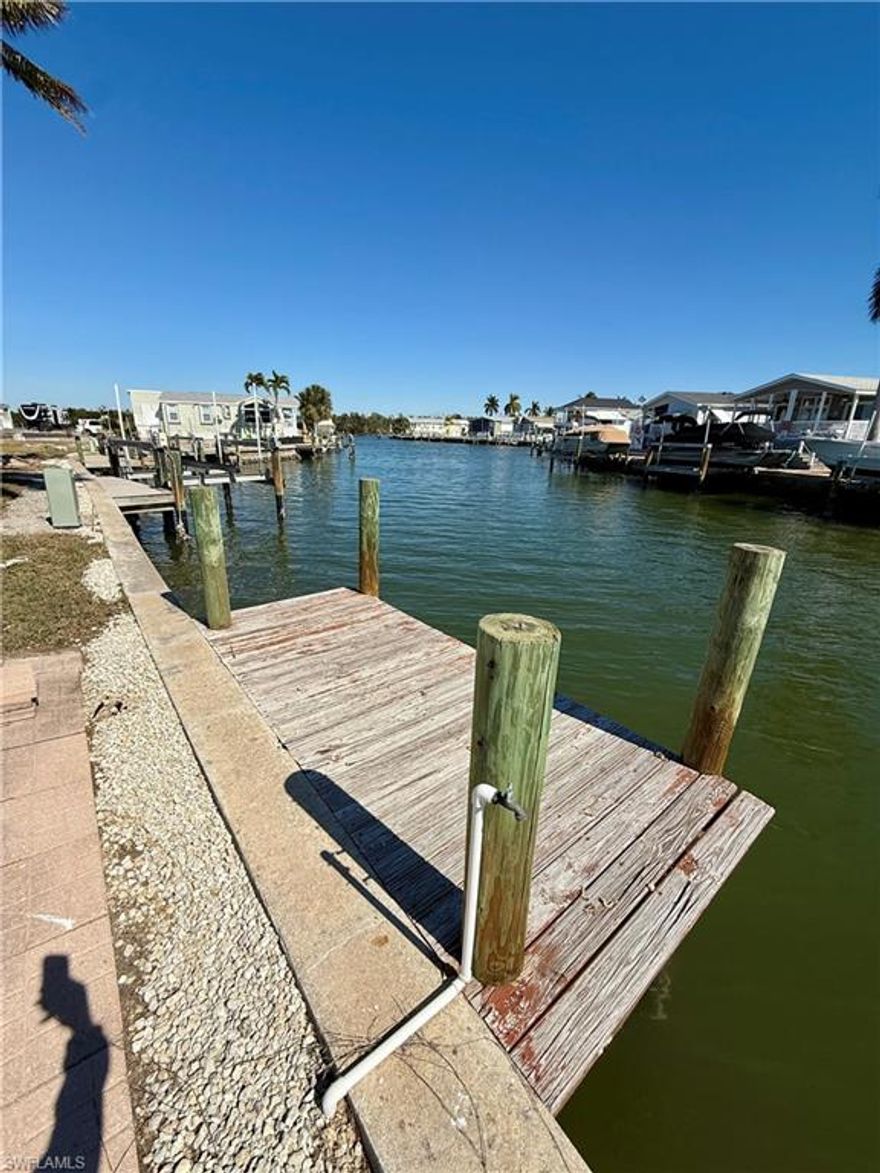 Waterfront vacant lot located at 52 Doubloon Way in Port Carlos Cove. This canal-front property offers Gulf access and provides a great opportunity to build your own coastal retreat in one of the most desirable boating communities near Fort Myers Beach.

Enjoy quick access through the back bay to the Gulf of Mexico for boating, fishing, and island hopping. Port Carlos Cove is a waterfront community known for its relaxed coastal lifestyle and convenient location close to beaches, waterfront dining, marinas, and shopping.

Community amenities include a community pool, clubhouse, boat ramp, and common areas designed for residents to enjoy the waterfront lifestyle. This lot is ideal for those looking to design and build a custom home while enjoying the Southwest Florida boating lifestyle. A rare opportunity to secure Gulf-access land in a well-known waterfront community just minutes from the beach.