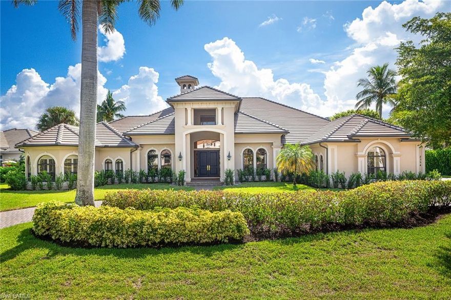 “A touch of the Caribbean” is an estate property in the prestigious Grey Oaks Country Club.  Golf membership is immediately available. Facing three Palm Course fairways, this home feels like a private island oasis while also offering lots of entertaining amenities including a spacious lanai with summer kitchen, a long pool with special light-show lighting and beautiful travertine marble flooring. Also, Important to note are the new roof, whole-house generator, whole-house water filtration system, living room fireplace, volume ceilings, air-conditioned three-car garage and a wonderful flow of space. Grey Oaks is an award-winning club with state-of-the-art amenities including three golf courses, a 30,000-square-foot wellness center, active tennis and pickleball, fitness and social programs. Old Naples, fine dining, the beaches, and international and private airports are easily accessible.