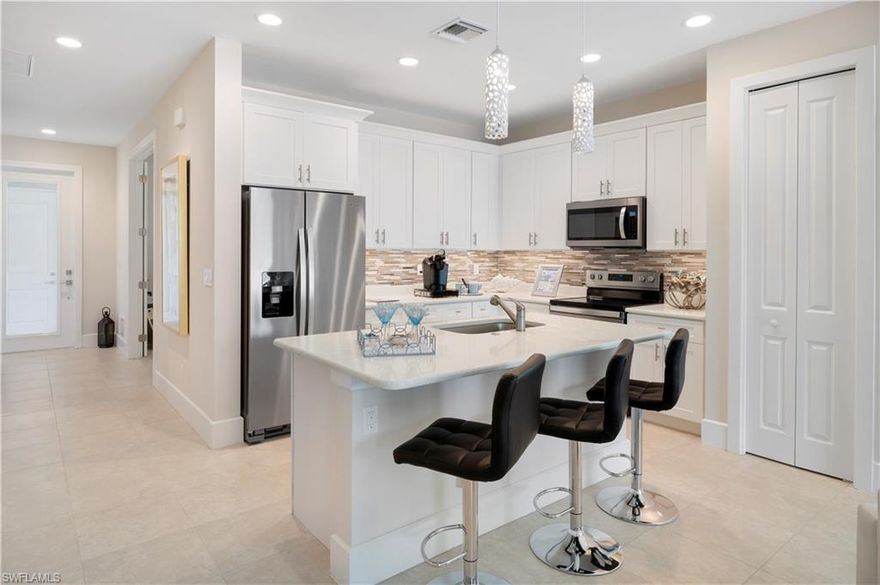 V.2893 - CONSTRUCTION COMPLETE!MOVE IN READY!JUST PICK YOUR FLOORING!PROVIDING ISLAND LIVING AT OFF ISLAND PRICES!This boutique style community is offering ONLY 26 homesites.THIS HOME CAN BE BUILT AS A 2 + DEN OR 3 BEDROOM,2 FULL BATHS!This sought after paradise is situated off of Davis Road,just minutes from the Sanibel causeway!The prime location provides proximity to shopping, dining, nightlife and the natural beauty of SW Florida’s sugar sand beaches!These spacious,well-appointed,paired villa homes offer a highly sought-after lifestyle boasting nearly 1600sq.ft. of living space.Let the awe-inspiring design impress you with its attention to detail at every turn.The expansive selection of included finishes completes the ambiance with volume & trey ceilings,18-inch tile floors & designer carpet,hardwood cabinets,granite countertops,paved driveway,Whirlpool kit. SS appl. package.Many upgraded features to choose from,all designed for a superior living experience, a sun filled pavered deck,8' doors & hurricane impact glass.Convenient location,captivating design,carefree lifestyle.SECURE YOUR SLICE OF PARADISE TODAY!Be sure to watch video!This homesite cannot accommodate a pool.