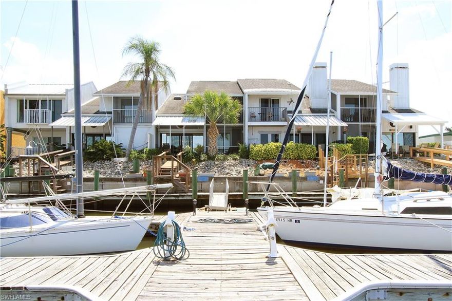 NAUTICAL PARADISE ON NAPLES BAY! BOATERS OPPORTUNITY TO LIVE DIRECTLY ON THE BAY. WATCH THE SUN SET WITH FOUR SCREENED LANAIS FOR AMAZING VIEWS! WOOD FLOORS, VAULTED CEILINGS. BOAT SLIP INCLUDED WHICH CAN ACCOMMODATE 36FT. BOAT. EASY WALK TO 5TH AVE AND DINING. OPTIONAL MEMBERSHIP TO NAPLES BAY RESORT CLUB HOUSE AND POOL, WHICH IS ALSO WITHIN WALKING DISTANCE. A MUST SEE...