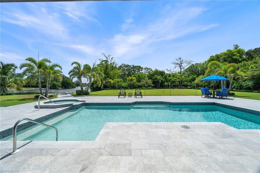 Welcome to a private, gated estate in the heart of Pine Ridge Estates. Set on 1.61 acres, this custom residence offers more than 4,700 square feet of living space and a rare blend of privacy, scale and refined luxury. The main home features four bedrooms and four-and-a-half baths, including a sophisticated primary suite with a large double-vanity bath, soaking tub, sunlit walk-in shower and private outdoor garden with an additional shower. A second en-suite bedroom with a spacious walk-in shower, along with two additional bedrooms and a full bath, complete the residence's main quarters.

Thoughtfully designed for both everyday living and exceptional entertaining, the home includes a dedicated home office and spacious living and dining areas that flow seamlessly into the outdoor retreat. The gourmet kitchen is equipped with a newly added cooktop and custom cabinetry. Exterior updates in 2020 include a new roof, pool decking, fencing, lush landscaping, garage cabinetry and a custom firepit.

A detached three-car garage includes a private one-bedroom, one-bath guest apartment offering ideal accommodations for extended-stay visitors. Located just minutes from Waterside Shops, Mercato and Naples' renowned beaches and dining, this estate delivers luxurious indoor-outdoor living in one of Naples’ most coveted communities.