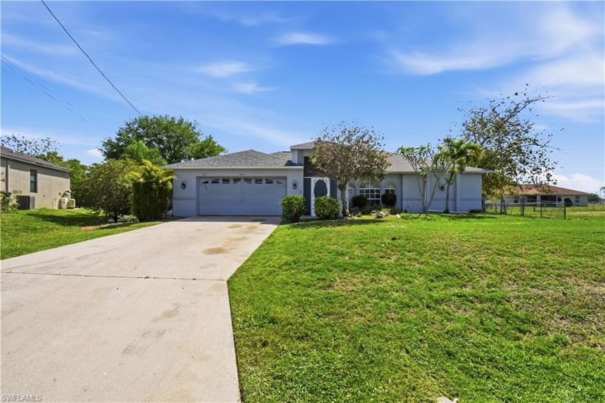 Move-in ready home on an oversized triple lot offering exceptional space and privacy! Features include a new roof, new well, new AC, and fresh interior and exterior paint. Bright, clean interior with plenty of potential for a pool, expansion, or outdoor living. A great opportunity for homeowners or investors alike—major updates already completed for peace of mind.