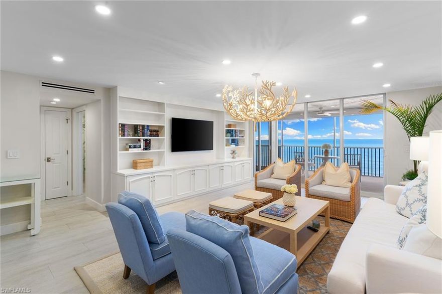 Welcome to your quintessential Naples beachfront retreat at the Diplomat Club, where stunning, direct Gulf views set the stage for an exceptional coastal getaway. Cute as can be and sure to wow buyers, this renovated two bedroom, two bath residence offers a fabulous great-room layout with modern coastal finishes throughout. The spacious kitchen features custom white cabinetry and quartz countertops, a generous breakfast bar and wine cooler, flowing seamlessly into the inviting living area with new Serena & Lily furnishings, a striking oversized coral chandelier (furnishings negotiable), and sliders opening to a beachfront balcony with picture-perfect views. The Gulf-facing primary suite enjoys private access to the screened beachfront balcony and an updated bath with dual sinks and a glass-enclosed walk-in shower, while the guest suite offers convenient access to a full bath. Additional highlights include impact windows and doors, electric balcony shutters, in-residence washer and dryer, and effortless beach access. Residents enjoy a Gulfside pool, on-site manager, community room with library, and a prime location next to the renowned Edgewater Hotel and just down the street from the new Four Seasons, both offering dining and convenient accommodations for overflow guests. Minutes from downtown Olde Naples. A delightful, move-in-ready beachfront escape.