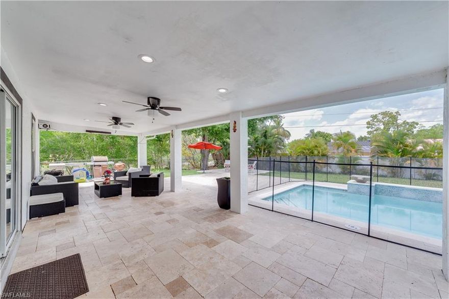 FULLY UPDATED 3/2 SINGLE FAMILY POOL HOME IN CENTRAL BONITA SPRINGS LOCATION.  Beautifully updated expansive stunning kitchen with hooded cooktop, huge center granite island, built in appliances and tons of dark wood cabinetry. You will love the open floor plan with tile throughout, both bathrooms are updated with new white cabinetry and granite countertops. The large outdoor living tops this one off with expansive travertine surrounded by a newer pool and jacuzzi with gorgeous fountains and tile. Entertainment abounds with an outdoor cooking area, lounging area and then you can end your day at the firepit!