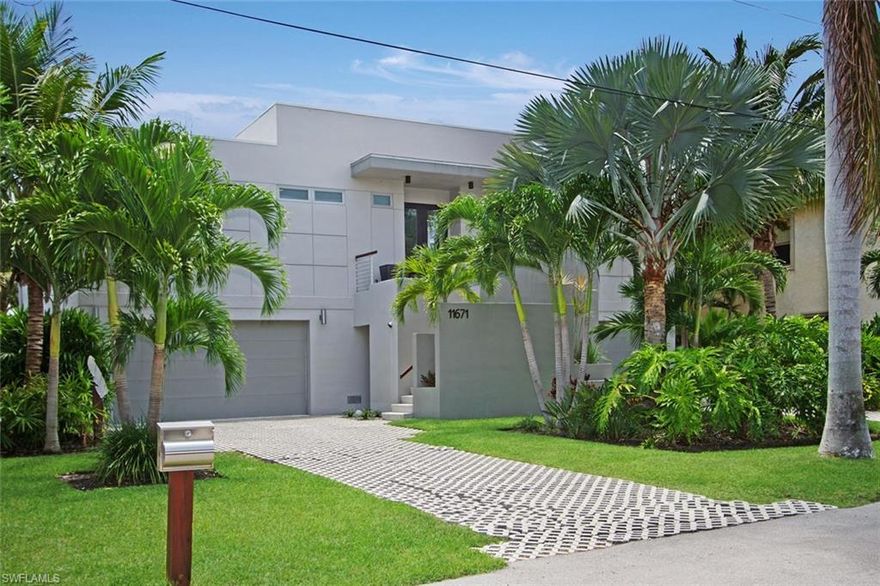 The Fabulous Layout of This Light-Filled Contemporary Home is Designed for Easy Living Especially for Those Who Appreciate Modern Architecture And Enjoy an Active Boating Lifestyle. Perched 18 Feet up You'll Revel in the Serene Views of Water, Preserve, Manicured Grounds, Open Pool and Outdoor Living Areas. Park in Your 5 Car Garage and Ride the Elevator Up Into This Very Special 3 Bedroom Home With High Ceilings, Tons of Natural Light and Hurricane Rated Windows and Doors. Some Features To Be Noted Are The Maple Wood Flooring, 9 1/2 to 13 Ft. Ceilings, Gas Cook Top, Gas Tankless Hot Water Heater, Salt Water Pool, Generator Plug In, 10,000 LB Boat Lift Plus Dockage for 45' Boat. Don't Miss Your Chance to Own This Fantastic Home In A Hidden Gated Community Just Minutes From Estero Bay and The Beaches.