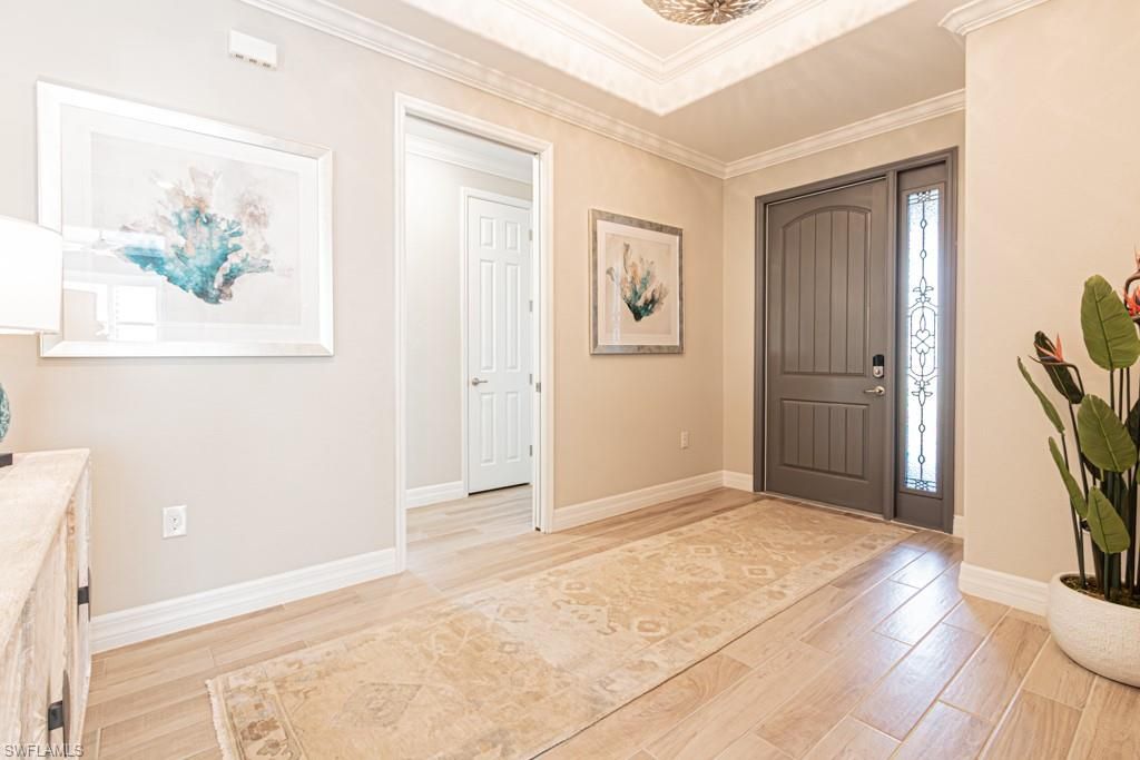 Photo of 1869 MUSTIQUE ST, NAPLES, FL 34120 (MLS # 226005433)