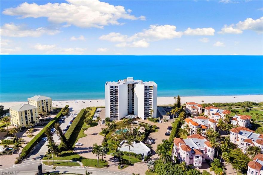 Enjoy refined coastal living in this beautifully renovated residence at Horizon House in Park Shore, with a comprehensive renovation completed in October 2025. This spacious two bedroom, two bath condominium offers an open, light filled floor plan designed for everyday luxury and effortless entertaining, with meticulous attention to detail in every corner. The open kitchen, complete with a walk-in pantry and coffee bar, flows seamlessly into the living and dining areas. A serene tropical balcony overlooks the lushly landscaped community pool, framed by mature palms, while the primary suite enjoys a view of the Gulf and offers extensive storage with room for all of your belongings, including an ample walk-in closet. Sophisticated, all new interior finishes include 24x48 porcelain tile flooring throughout, Taj Mahal quartz countertops in the kitchen and bar, Level 5 smooth wall finishes, a fireplace, and spa inspired baths with porcelain tile, quartz countertops, Toto bidet toilet, Madeli Illusion recessed medicine cabinets, and Moen remote shower controls, including a steam shower in the primary suite. This residence has been completely reconstructed inside and behind the walls, including all new plumbing, electrical, HVAC systems, and infrastructure. Recent improvements also include a new air conditioning system, new hot water heater, and all new fixtures throughout. Added features include private laundry, impact resistant windows and sliders, along with electric shutters. One assigned under-building garage parking space and private storage are included. Horizon House enjoys a prime beachfront setting at the southern start of the Park Shore Beach Association’s renowned paved beach walkway. Amenities include a heated pool, a newly renovated social room with catering kitchen and bar, fitness and game rooms, outdoor grilling area, bike and beach storage, electric vehicle charging onsite, on-site management, and 24-hour staff on-site. Ideally located near Venetian Village shopping, dining, and marina, and just minutes from Waterside Shops and downtown Naples.