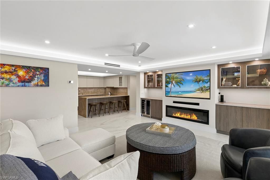 Photo of 3951 Gulf Shore BLVD N #205, NAPLES, FL 34103 (MLS # 226002654)