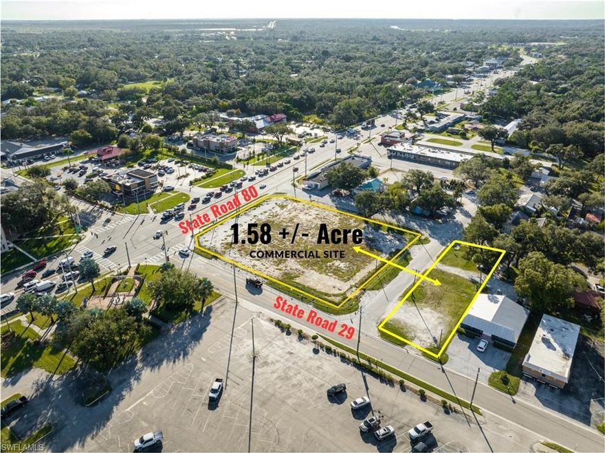 PRIME COMMERCIAL CORNER WITH TRAFFIC SIGNAL IN THE HEART OF LABELLE. Purchase this 1.58 +/- acre commercial site for your business or investment acquisition. Perfect location for a gas station, retail plaza, financial center, doctor's office and much more. Heavy traffic counts with non-stop traffic for east and west coast travelers from West Palm Beach/Maimi to Fort Myers/Cape Coral. Located in the middle of the city with McDonald's and Burger King across the street and the Hendry County Courthouse at the opposite corner. Vacate the cut-through road to maximize the size of this lot for endless opportunities. State Road 80 is a hurricane evacuation route and growth in LaBelle has skyrocketed int he last 10 years. Now is the time.