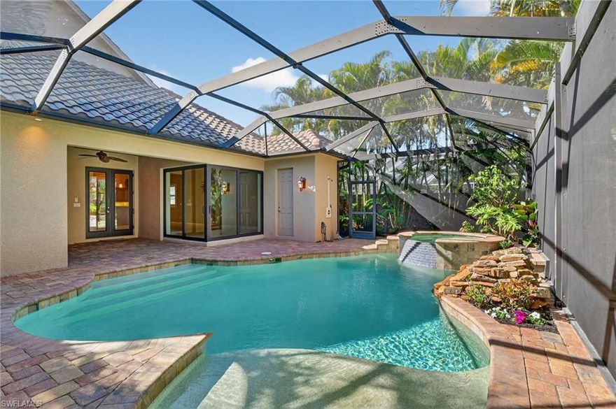 Ideally located just minutes from the white sand beaches of Vanderbilt Beach, this beautifully appointed residence offers the ultimate Naples lifestyle with no HOA restrictions. Nestled in the highly desirable Naples Park neighborhood, the home features a light-filled open-concept design with soaring ceilings, tile flooring throughout, and seamless flow between living, dining, and kitchen spaces—perfect for everyday living and entertaining alike.
Step outside to a private backyard retreat designed for year-round enjoyment, complete with a resort-style pool featuring a tranquil water element, a fully equipped outdoor kitchen, and a cozy outdoor fireplace—ideal for gatherings, sunset evenings, or relaxing in complete privacy. The thoughtfully designed outdoor living space extends the home’s functionality and captures the essence of Florida indoor-outdoor living.
Conveniently located near world-class dining, shopping, and entertainment at Mercato, and just a short bike ride to Vanderbilt Beach, Delnor-Wiggins Pass State Park, and area boating access. Whether used as a primary residence, seasonal getaway, or investment property, this home represents an exceptional opportunity to own in one of North Naples’ most sought-after communities.