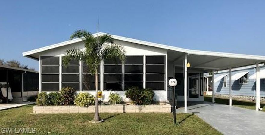 Nice large home with a fresh coat of exterior paint in a great community. It has 2 big bedrooms and a master bath with a separate tub and shower as well as a walk-in closet. Indoor laundry off the kitchen is so convenient. This home has a Florida room across the front so you can watch the world go by, or sit outside in your screened lanai under the carport. There is also a shed with lots of space for storage or hobbies. Horizon Village is a very well-run community, with nice sidewalks, streetlights, a community pool, and spa, as well as a clubhouse with lots of activities.