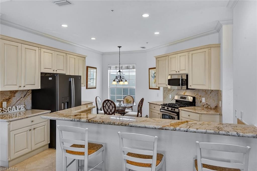 Photo of 9263 Museo CIR #102, NAPLES, FL 34114 (MLS # 226010306)