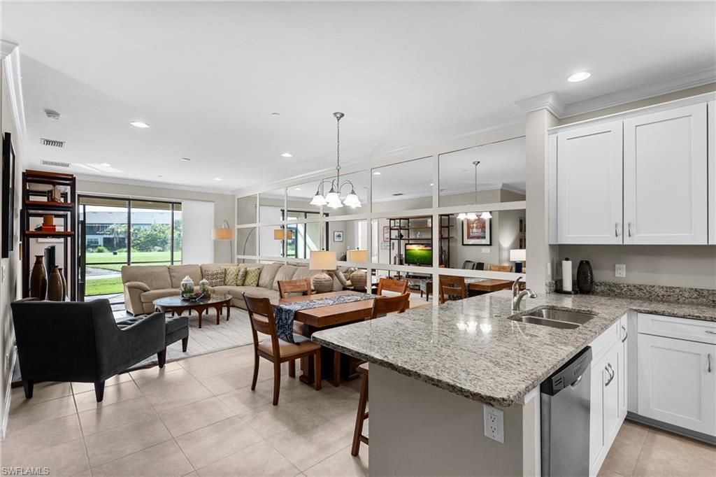 Photo of 9366 Pocida CT #103, NAPLES, FL 34119 (MLS # 225071900)