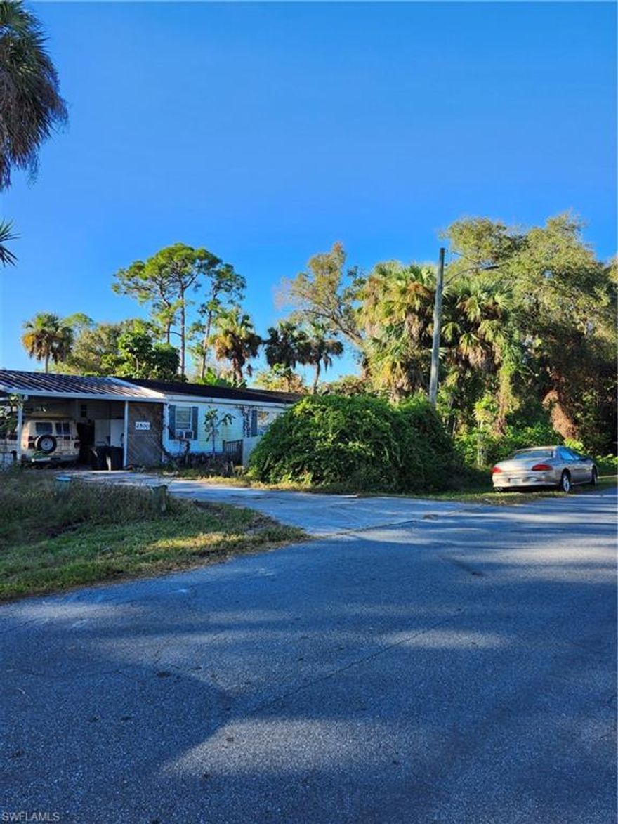 This 3/2 manufactured home is located on an oversized lot in Spring Woods HOA.  Spring Woods offers a club house for community activities as well as a pool and billiards, there is an additional storage area available for boats, RV's etc.  The property is being sold AS-IS, cash offers only. The home has several repair issues that need addressed, it needs an investor/handyman/contractor to rehab the home, cash offers only please. The home is part of an open Lee County, Fl Guardianship case, any sale is contingent on the Court first approving the sale, the Court approval process will determine the contract closing date.  The Guardian is not familiar with the condition of the property and will not make any repairs to the property whatsoever of any kind as part of the sale. There is a lot of personal belongings & debris both inside and outside of the property, buyer will be responsible for the removal of ANY AND ALL personal property including but not limited to, debris, miscellaneous personal property, vehicles, etc. located on and about the premises as Seller will not be removing any of these items from the property as part of the sale. Seller does not have the titles to the car or the van that are located on the property, the vehicles will be left on the property, buyer will need to assume the responsibility of dealing with them.  Currently the electric, water and sewer have been turned off to the property, the electric utility can only be turned on temporarily as part of the inspection process once there is a fully executed contract, the buyer will need to pay the cost to have the electric utility temporarily turned on if needed.  The water & sewer utilities cannot be turned on prior to closing as the Guardianship does not have the money to pay to have the services turned on.  The buyer will be responsible to pay the water & sewer utility bill at closing, including past due amounts/fees/costs owed.