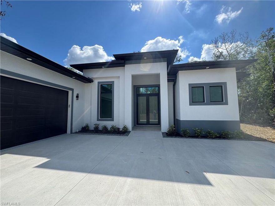 NEW CONSTRUCTION!! BEAUTIFUL 3 +DEN , 3 BATH AND 2 CAR GARAGE SITS ON  ACRES LOT 1.59 ........THIS BRAND NEW HOME ALSO FEATURES A BRIGHT & OPEN FORMAL LIVING & DINING ROOM, IMPACT WINDOW, GRANITE COUNTER TOPS, STAINLESS STEEL APPLIANCES, AIR CONDITIONER LINEAR VENTS, TILE FLOOR WITH SPLIT BEDROOM, TRAY CEILING, AUTOMATIC IRRIGATION SYSTEM, ASPHALT DRIVEWAY, AND MORE....BRING YOUR FAMILY AND YOUR PETS AND MAKE THIS HOME AN AWESOME PLACE TO LIVE . VERY PRIVATE AND CONVENIENTLY LOCATED NEAR SCHOOLS AND SHOPPING CENTERS.