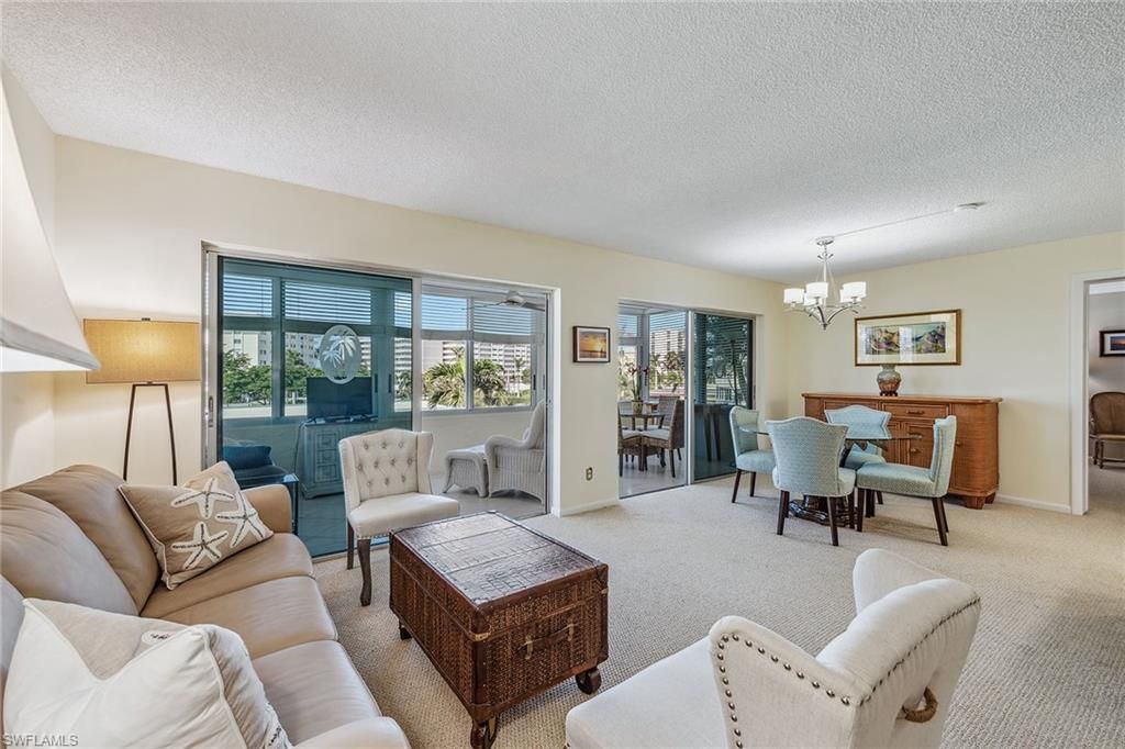 Photo of 3410 Gulf Shore BLVD N #305, NAPLES, FL 34103 (MLS # 225065682)