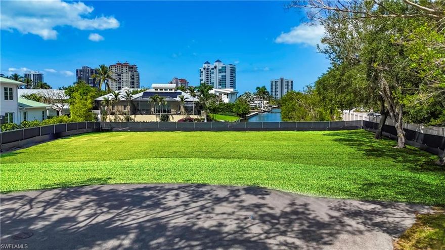 Presenting a rare and unique opportunity to build your custom luxury estate on a .43-acre cleared and ready-to-build lot in the highly sought-after Seagate community of Naples. Larger than most parcels in the neighborhood, this expansive west-facing, cul-de-sac property offers enhanced flexibility for architectural design and features a newly constructed seawall for added value and long-term stability. With direct canal frontage on intersecting waterways, the lot offers access to Clam Bay and beyond to the Gulf. Nestled in a quiet enclave just moments from Naples’ most celebrated destinations—including Waterside Shops, Mercato, Venetian Village, and Artis—Naples—this location offers a rare blend of tranquility and accessibility. Residents may also join the Seagate Beach Club, a members-only retreat with private beach access, gated parking, picnic areas, restrooms, and more, all just a short stroll or golf cart ride away. With limited opportunities remaining to secure a waterfront lot of this size and quality in one of Naples’ most exclusive neighborhoods, this property represents an unparalleled chance to create a one-of-a-kind coastal sanctuary.