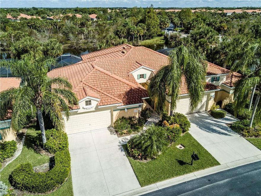 Former Model -Immaculate & pristine attached villa with fabulous lake and fountain view.  Spacious kitchen  complete with island, granite countertops, tile backsplash, newer Samsung stainless steel appliances, GE dishwaser, eat-at-bar, under cabinet lighting and pantry.  Master Bedroom and Guest features wood flooring.  2- Car Garage has upgraded Garage Tek wall storage.  Large pool and spa plus outdoor kitchen complete your outdoor enjoyment and entertaining.  Best of all this lovely villa is complete with hurricane protection on all sides. (One original owner.)
The 100% Lakefront community of Lighthouse Bay is an amenity-rich community with 44 acres of lakes, 70 acres of greenspace and 26 acres of wildlife preserve, 5 picturesque cobblestone bridges, and 32 fountains. 
Enjoy the 5 POOLS- an 82 foot lap pool in Swimming Atrium, Lagoon Pool is 2500 square foot freeform with rock waterfall and spa, plus 3  cabana pools, 6 lighted HydroCourt tennis courts, Bocce Court, Health Club with cardio exercise area, Massage room, Boathouse with lighthouse, paddle boats, canoes and fishing boats.
Freshwater Sunning Beach,  3 Miles of Walking Paths, and 10 acres of Old Florida nature park.