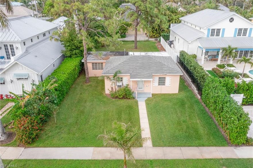 Owner Financing Available. This exceptional property, nestled in the heart of Olde Naples, boasts an unparalleled location just three blocks from the beach and four blocks from the vibrant 5th Avenue South. Tucked away on a tranquil street with coveted alley access, this property offers both convenience and privacy. Remarkably, the home has never experienced flood damage from any hurricane or storm, thanks to its rare and highly desirable "X500" Flood Zone designation. With no HOA requirements, this property offers unparalleled freedom to design and enjoy your home without restrictive rules or additional fees.                                                                                                                                  

This expansive 9,000-square-foot lot in the heart of Olde Naples presents an extraordinary opportunity to craft your dream home in one of the most coveted locations in Southwest Florida. Envision designing a luxurious sanctuary with an open, airy layout, a chef’s kitchen, and a resort-style pool—steps from the pristine beach and the lively 5th Avenue South. The possibilities are as limitless as your imagination. Whether you dream of a timeless coastal retreat, a sleek modern showpiece, or a thoughtfully reimagined historic cottage, this property offers the perfect canvas to bring your vision to life. Immerse yourself in the Olde Naples lifestyle and create a home that embodies your style, aspirations, and desires. 
                                                            
Olde Naples is a neighborhood like no other, exuding a timeless charm that seamlessly blends history, luxury, and the beauty of coastal living. Picture yourself meandering down coconut palm-lined streets, where nearly every avenue—such as 1st Avenue South—leads to the sparkling shores of the Gulf. This enchanting area features a harmonious mix of architectural styles, from quaint cottages to opulent estates, all within a leisurely stroll of upscale boutiques, renowned restaurants, and world-class art galleries. With its vibrant social energy and serene coastal ambiance, Olde Naples offers an unparalleled lifestyle, embodying the very essence of Naples living at its finest.                                                                                                                                                                                         
                                              
The existing historic cottage-style residence features 3 bedrooms, and 2 baths is in need of TLC and is being sold "as is," presenting an extraordinary opportunity for renovation or redevelopment. Spanning approximately 9,000 square feet, the lot provides ample space to build your dream home, complete with room for a pool.                    
Seize this rare chance to craft your own piece of paradise in one of Naples' most sought-after neighborhoods!