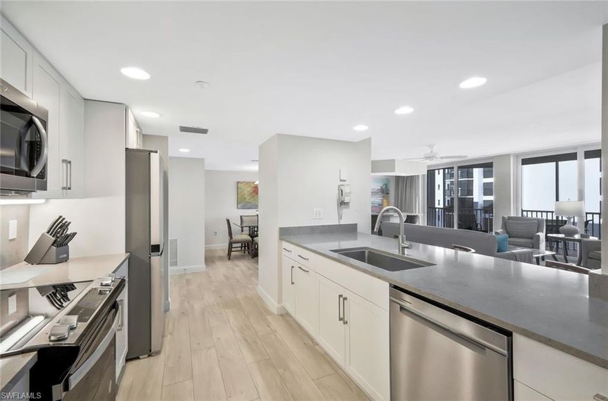 Enjoy elevated coastal living on the fifth floor of this beautifully maintained Gulf-front residence at Gullwing Beach Resort. This TWO bedroom, TWO bath condominium offers breathtaking views and delivers the ultimate beachfront lifestyle with direct beach access just steps from your door. Designed to impress, this spacious residence offers approximately 1,450 square feet under air and an open, split-bedroom floor plan that feels bright, airy, and welcoming. The living and dining areas flow seamlessly, creating the perfect space to relax or to entertain while enjoying a luxury lifestyle. Two large bedrooms, built-in cabinetry, a wet bar, and expansive windows enhance both comfort and functionality. The primary suite provides a private retreat with a spa-inspired bath featuring dual sinks, a jetted tub, and a separate shower. Impact-resistant windows and doors offer peace of mind and storm protection. Step outside and enjoy resort-style amenities including a beachfront pool and spa, fitness center, tennis courts, bike storage, and grill areas, all within a secure, well-maintained high-rise community. Gullwing Beach Resort allows daily rentals, making this an exceptional opportunity for personal use, investment, or both. Perfectly positioned on Fort Myers Beach, this residence is close to dining, shopping, entertainment, and just a short drive to RSW International Airport. Whether you are searching for a full-time beachfront escape, a seasonal retreat, or a high-performing rental property, this move-in-ready condo offers comfort, convenience, and the unmistakable luxury of Gulf-front living.