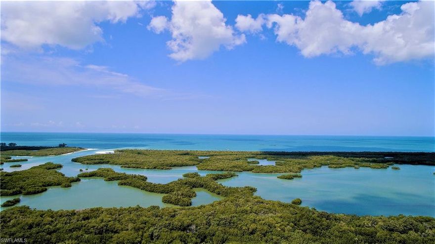 Immediate Occupancy! Unique, sophisticated European design with private elevator lobby & foyer with tongue and groove walls. This 4 bed 4 bath unit has the open floor plan for today's living. Hardwood floors with extensive ceiling details in every room.  Totally redesigned kitchen and butler’s pantry.  All upgraded cabinets, with 3 inch mitered quartzite countertops and custom stone sink.  Wolf & Subzero appliances with double oven+warming drawer, built in espresso machine and natural gas cooktop. Multiple refrigeration drawers and ice maker make this an entertainer's dream kitchen.  The full length windows frame the outside views of the Gulf and Beaches. Step out from the master bedroom onto a 600 sqft lanai.  Fully redesigned custom master bath and closet make this unit anything but STANDARD.  Kalea Bay offers a rooftop pool and an extensive array of amenities. The club amenity center has 3 pools; Childrens pool, family pool and adult only pool, indoor/outdoor restaurant and poolside bar. Tennis and pickle ball courts and guest suites for your guests to enjoy. Kalea Bay is the resort staycation you can call home.