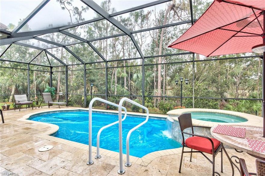 Fantastic pool home in gated community! Located in the heart of Naples, close to everything! This gorgeous pool home offering over 2,000sf of living space in a Living Room/Family Room classic layout & a split bedroom floor plan has OVER $85k in upgrades. Aqua Links pool system, natural gas (for pool/spa, cooktop, dryer, hot water heater), volume & tray ceilings, custom electric fireplace w/ beautiful stonework, tile & laminate throughout sliders to the lanai providing lots of natural lighting & a peaceful view of the preserve, are just some of the reasons you will want to call this house "HOME". The kitchen featuring a gas cooktop, wall oven, granite countertops, and stainless steel appliances is the perfect gathering place for the family w/ a breakfast bar & breakfast nook. Recent updates to the home include-new laminate wood-look flooring, new hot water heater, new screens in pool cage, new travertine pavers on pool deck & covered lanai, and the a/c unit was replaced just 2yrs ago. The gated community of Aviano has easy access to everything it is just a short drive the beautiful beaches of SWFL.