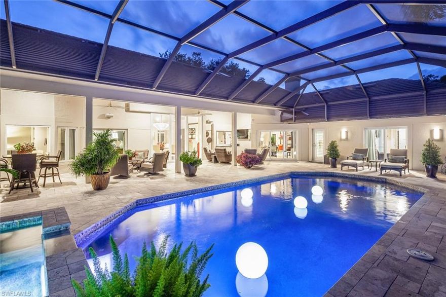 Remarkably remastered and meticulously maintained estate home in the heart of Pelican Bay. Open floor plan with chef‘s kitchen and butler‘s pantry, Subzero/Viking appliances, generous cabinetry, tons of counter space, two refrigerators, dual wine refrigerators, dual ovens, dual dishwashers… and an outdoor kitchen with both gas grill and a big green egg, this home is designed with a chef in mind! 4 bedrooms, 3.5 baths, a private office, great room, family room, breakfast nook, eat-in kitchen, and 2 car garage. Luxurious master suite boasts a private laundry room, huge walk-in closets, and a stunning modern bath. Completely remastered outdoor living with saline pool, integrated spa, sun shelf, water bubblers, and more. Newer roof, impact windows and doors, whole house generator, home automation, premier security features, and much more. Ideally located within walking distance to Artis Naples, Waterside Shoppes, and 2 private Pelican Bay beach clubs. Pelican Bay is the hottest location in Naples with 3 miles of beach, an active tennis program, 27 holes of golf and much more. This home is the best value currently available in Pelican Bay, and a must-see for the discerning Buyer.