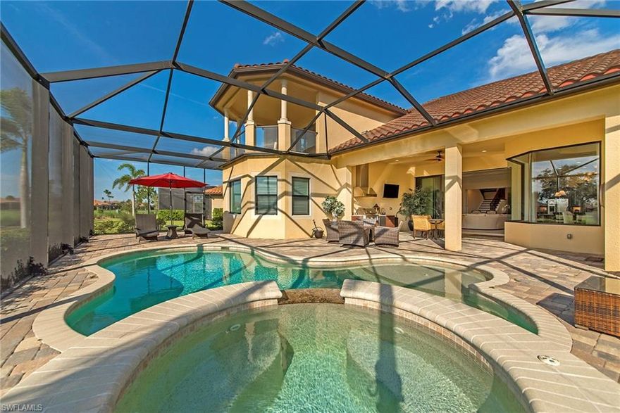 Stunning Estate Home w/ golf course & lake view! This two-story home has the Turnberry Grand floor plan w/ over 3,800sf of living space and all the bedrooms & the study having private baths and features . Offering an amazing view of the 5th green of Twin Eagles' World Champion golf courses that is speckled with lakes, and features a massive screened lanai w/ pool, spa, & summer kitchen and an open lanai w/ fire pit on the second floor- makes this home the perfect place to entertain or just relax in the SWFL sun. Home is being offered TURNKEY, and it is furnished with high-end contemporary design furnishings throughout- plus golf membership is included in sale. Arched entryways, tile set on diagonal, coffer, tray & volume ceilings, mitered glass in dining area, collapsing sliders, crown molding, gorgeous French door front entry, wood staircase, gourmet designed kitchen, media/game room and hardwood flooring in the master suite are just a few of the bells & whistles.  You will fall in love with this home. Twin Eagles is a distinguished community that offers a new 47k sf Clubhouse w/ fitness center, 2 golf courses, over 1k acres of walking paths & nature preserves, and much more.