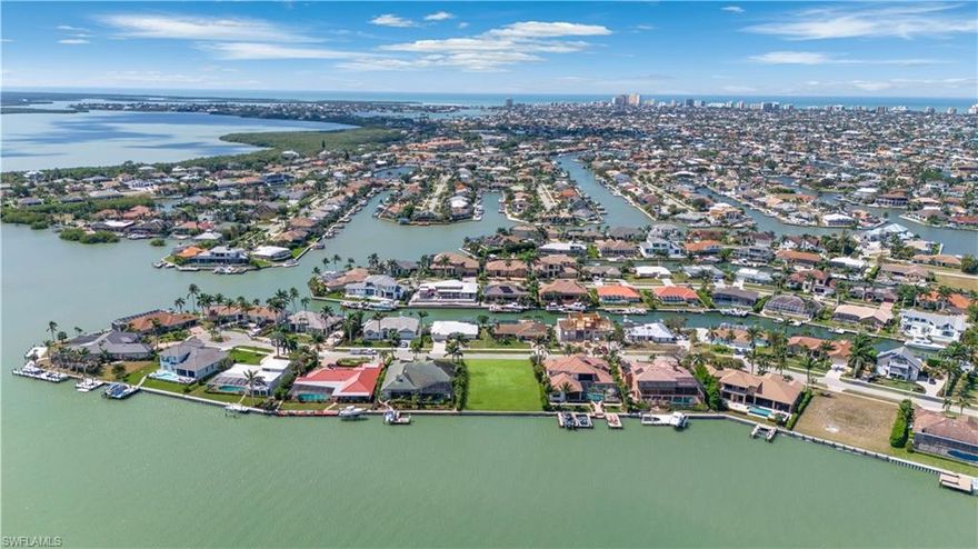 Envision your future luxury retreat on this direct access Riverfront homesite! Exceptional opportunity to build your dream home on this oversized lot on prestigious Stillwater Ct. Builder ready, .34 acre lot, approx. 100' of water frontage by 150'. You'll have plenty of room to build your future spacious residence and spacious dock with multiple lifts (seawall 2018) Wide water views out to the Marco River while you can gaze towards the preserve area which offers privacy. Excellent fishing & boating with quick deep water direct access to the Gulf & Ten Thousand Islands. Fantastic views of the sunrise, graceful passage of boats, dolphins & manatees swimming by your backyard. Seldom do opportunities like this present themselves in such a unique, sought-after riverfront locale.