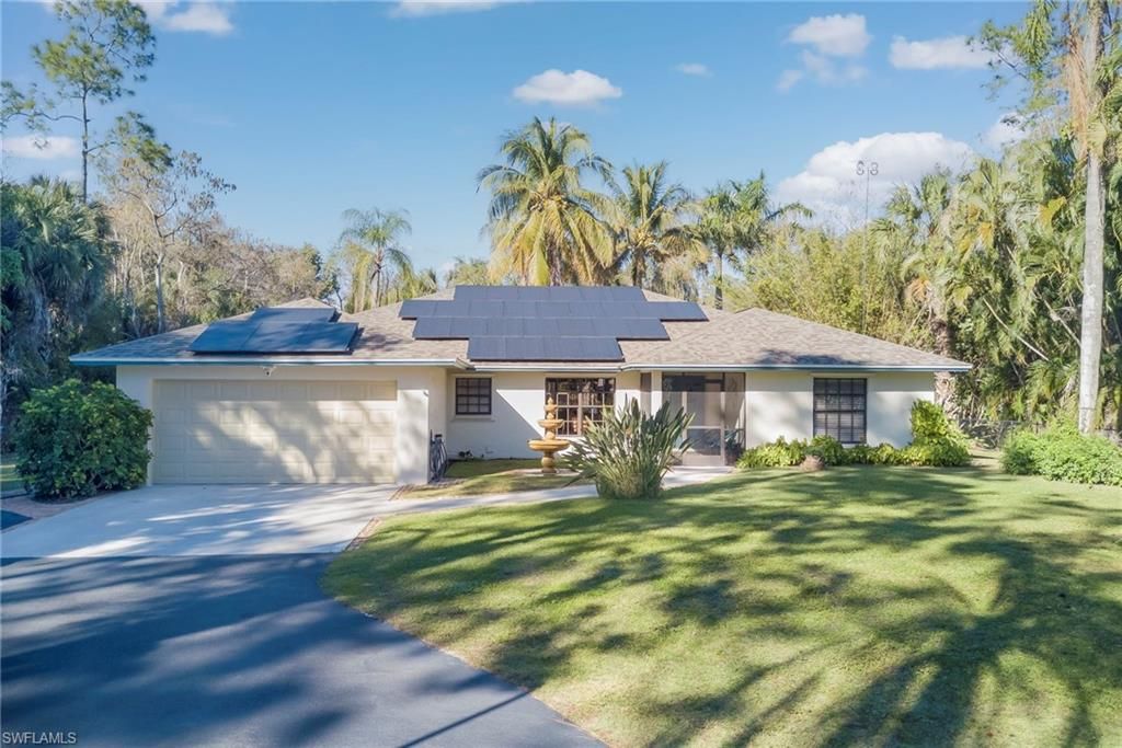 Photo of 5423 Teak Wood DR, NAPLES, FL 34119 (MLS # 226005079)