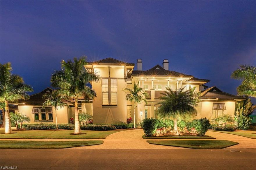 Better than new waterfront construction with long water views. This exceptionally well-built, all-concrete 5-bedroom, 5-1/2-bath home boasts super high-end finishes. It features wood-look tile throughout, exotic quartz countertops, shaker cabinetry, Thermador appliances, soaring ceilings, 10-foot tall pocketing sliders, custom closets and an elevator. A full home Sonos system and security system can all be controlled from the smart home iPad. There is a separate in-law suite on the main floor with a private entrance for longer quest stays with its own private lanai. Upstairs features 2 bedroom suites, a wet bar and a surround sound home theater loft area that is flanked by two balconies. The custom pool is long enough for laps and the completely private in-ground spa is perfect for relaxing after a long day on the boat or at the beach. A custom dock has been installed for up to a 38-foot boat with a 13+ foot beam on a 24k lift, 2 jet ski lifts, underwater lights and shore power. Quick Gulf access and proximity to Resident’s Beach access are sure to please boaters and beachgoers. The home is being sold fully furnished with all Restoration Hardware furniture throughout.