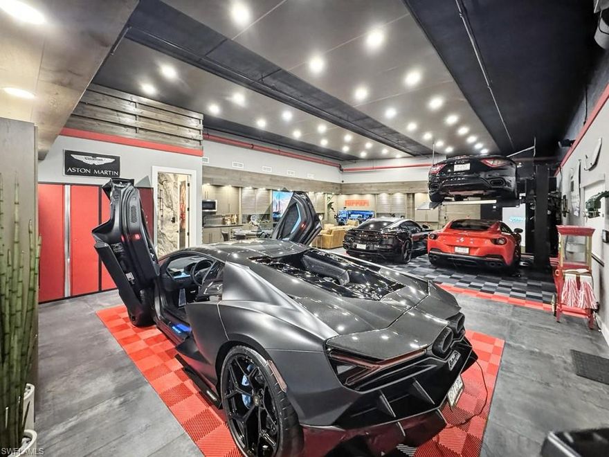 This one-of-a-kind retreat offers a rare opportunity to experience unparalleled comfort and elite-level leisure in a bespoke, private setting. Paradise Design-Build has completely redesigned and transformed this highly desirable, C-5 Zoned property located in the heart of Marco Island. Car enthusiasts will be impressed by the Race Tech Flooring, ample parking for up to 5 luxury sports cars with included car lift, indoor car wash station, built-in exhaust fan, and SimXperience Racing Simulator. If you aren’t in the mood for racing, enjoy the Fore Sight Quad 6 Golf Simulator where you can improve your game rain or shine. The sleek bar area is fully equipped with two beverage centers, icemaker, and microwave. Enjoy a high-stakes card game at the nearby poker table. Settle into the lounge equipped with a large screen television, premium surround sound, and high-end furnishings for the ultimate movie night experience or catching the big game in style. Discerning buyers will also appreciate the Josh smart home features, secured storage, custom-built Murphy Bed, and full bath. Whether for private use or for a business, this unique property provides endless opportunities. Don’t miss the chance to make this phenomenal, luxury retreat your own.