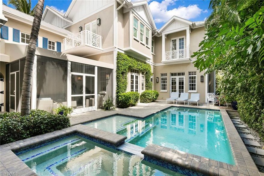 In the heart of Old Naples, Hemmingway Bay lives like a single-family home with only two units in the complex surrounded by lush, tropical landscaping. This completely updated villa boasts just over 3,800 square feet and has three bedrooms on the second floor which overlook the pool and includes elevator access. The light-filled home also has a connected private two-bedroom guest house that sits over the three-car garage. The gourmet kitchen features quartz countertops, custom cabinetry, Sub-Zero refrigeration, gas stove and wine cooler. The private outdoor lanai, pool and spa has beautiful southern exposure and is on a quiet street. It is within distance to shops and dining on both 5th Avenue and 3rd Street and just six blocks to the iconic Naples beaches.