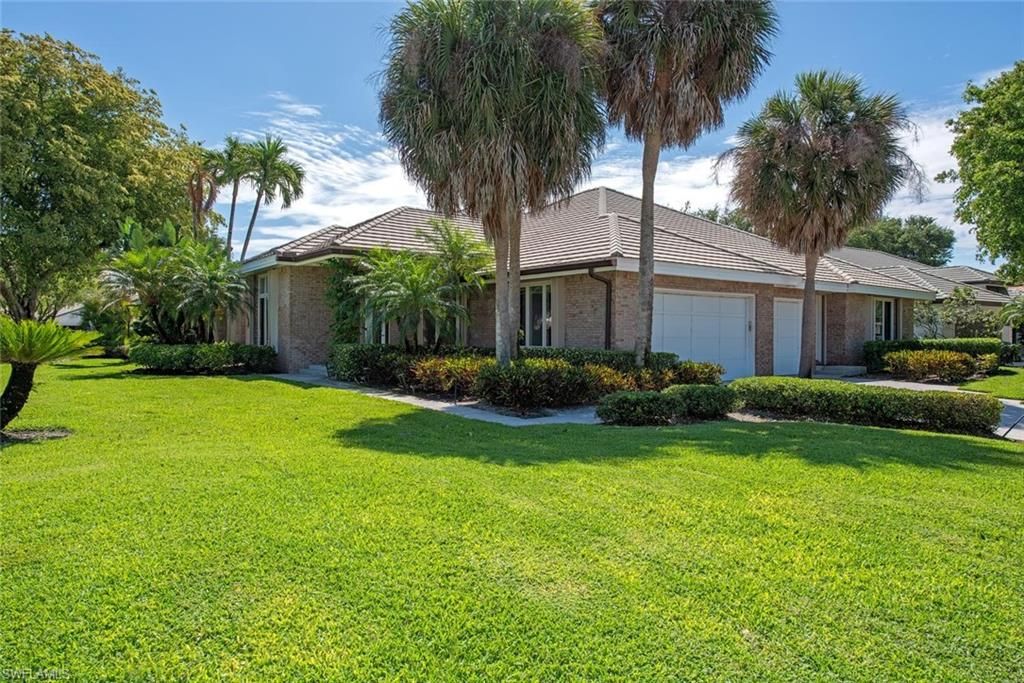 Photo of 7018 Greentree DR, NAPLES, FL 34108 (MLS # 226017541)