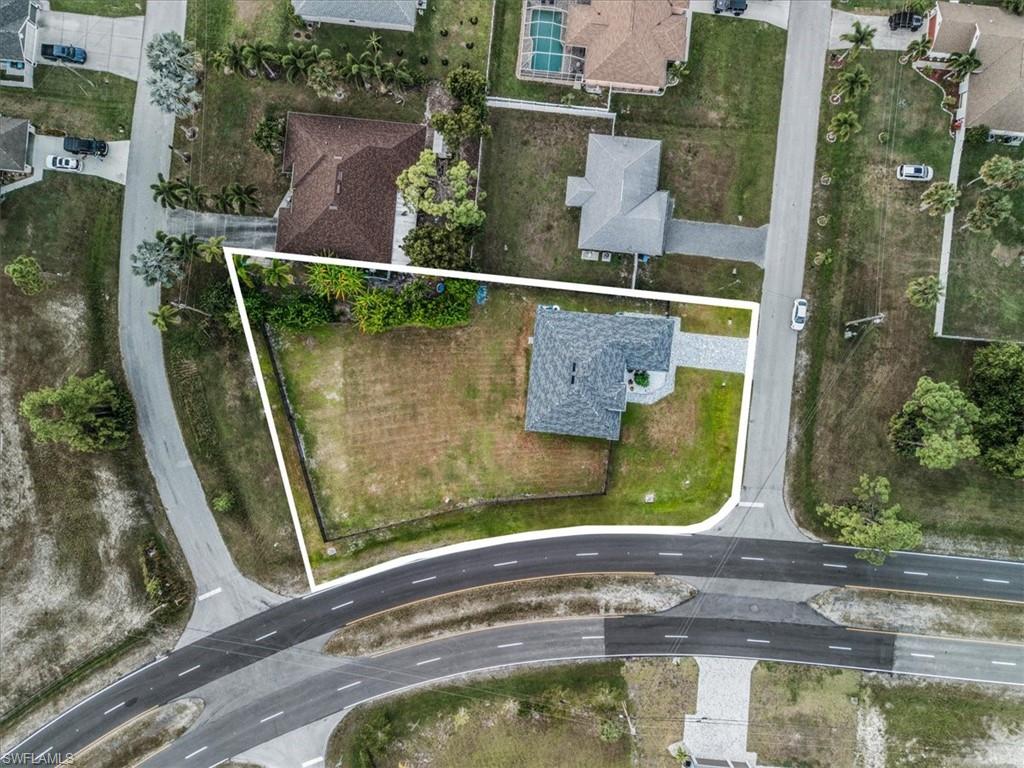 Photo of 1124 NE 35th LN, CAPE CORAL, FL 33909 (MLS # 226027525)