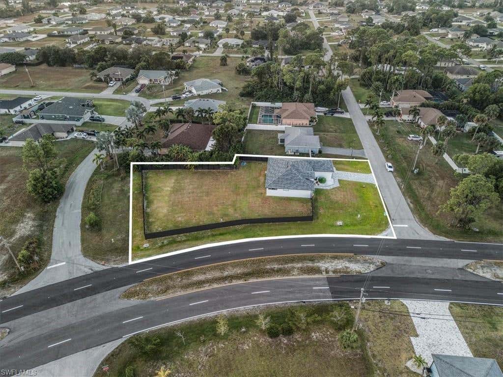 Photo of 1124 NE 35th LN, CAPE CORAL, FL 33909 (MLS # 226027525)