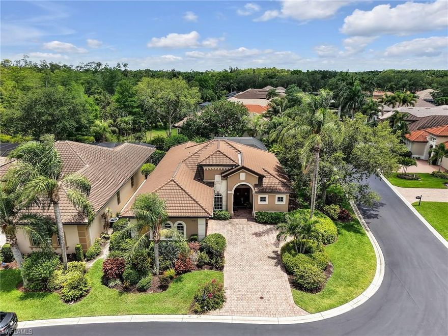 Tucked away on a quiet cul-de-sac street within the highly sought-after community of Grandezza, this turnkey furnished 3-bedroom, 2-bath pool home offers privacy, curb appeal, and an exceptional Southwest Florida lifestyle. Situated on a desirable OVERSIZED .31 CORNER LOT, the property features a side-load 2-car garage, an extended driveway, and lush mature landscaping surrounding the home and pool area. Located in the preferred Flood Zone X, this home also provides peace of mind with a NEWER TILE ROOF (2020), hurricane shutters along the rear of the home, plus electric hurricane rated screens enclosing the lanai. Inside, the home showcases timeless finishes including plantation shutters, crown molding throughout, and spacious living areas designed for both entertaining and everyday comfort. The kitchen features rich wood cabinetry, granite countertops, a tumbled marble backsplash, stainless steel appliances, a built-in beverage fridge, and a large breakfast bar that opens seamlessly to the family room. A sunny breakfast nook is highlighted by a frameless mitered glass window overlooking the lanai and pool area, creating the perfect place to enjoy morning coffee with tranquil tropical views. The adjoining family room also has sliders leading to the screened-in lanai with pool views. The thoughtfully designed floor plan also includes a formal dining room and living room with double tray ceilings accented with crown molding. The spacious primary suite offers sliding glass doors leading to the lanai, dual walk-in closets, and an inviting en-suite bath complete with separate vanities, a walk-in tiled shower, and a soaking tub. Step outside to your private outdoor retreat featuring a large pool and expansive deck surrounded by lush privacy landscaping, ideal for relaxing or entertaining year-round. At the heart of the community is The Club at Grandezza that is well known for its welcoming and highly social atmosphere. Residents enjoy an 18-hole championship golf course, an active tennis program, fitness facilities, and a resort-style pool and spa. The private 53,000 sq. ft. clubhouse serves as a true gathering place with multiple dining venues, indoor and outdoor seating, and a full calendar of social events, themed dinners, and activities designed to foster connection and community. Expansion of the Cabana, Bogey’s Kitchen, and Pro Shop is currently underway and expected to be completed in late 2026, further enhancing the club experience with no special assessment! Grandezza is widely regarded as one of Estero’s most engaging and community-driven country club environments, and OPTIONAL GOLF MEMBERSHIP IS CURRENTLY AVAILABLE. Beyond the gates, the location is second to none with everything at your fingertips— just across the street from Miromar Outlets & Publix and 10 minutes from Coconut Point for shopping, dining, and 10 minutes to Hertz Arena for concerts and sporting events, and only 15 minutes to Southwest Florida International Airport.