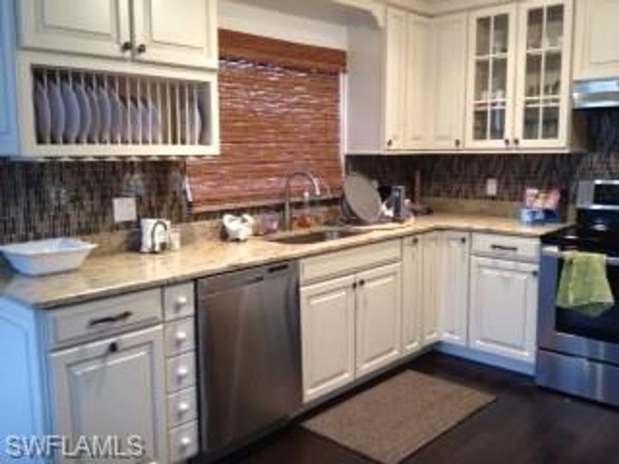 Completely remodeled 3-bedroom in Park Shore.  Walk to Gulf/Park Shore's  Private Beach Access (optional membership) and/or Venetian Village, both just steps away from your door.  This 2nd floor condo has been completely updated with high quality cabinets, Granite counters, LG kitchen appliances, glass backsplash, new soft close kitchen drawers, new vanity/baths,  darker laminate flooring, freshly painted, new AC, new Hot water heater and new stackable Washer/Dryer.  3 spacious bedrooms offer lots of natural light, ample closet space with Master Bedroom having a large walk in closet.  Living room is open to kitchen and dining area, yet offers privacy from bedrooms,  plantation shutters on dining windows as well as new light fixtures.  
Swan Lake Club pool is located on serene Swan Lake! One of a kind location for Park Shore, with newly renovated pool and extended pool-deck area, furnishings and grill.  All common hallways have been extensively updated with new floor tiles, stairways, ceilings and community is well maintained.