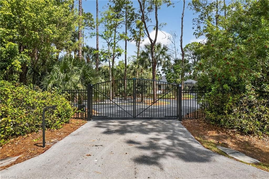 Photo of 4075 1st AVE SW, NAPLES, FL 34119 (MLS # 226011878)