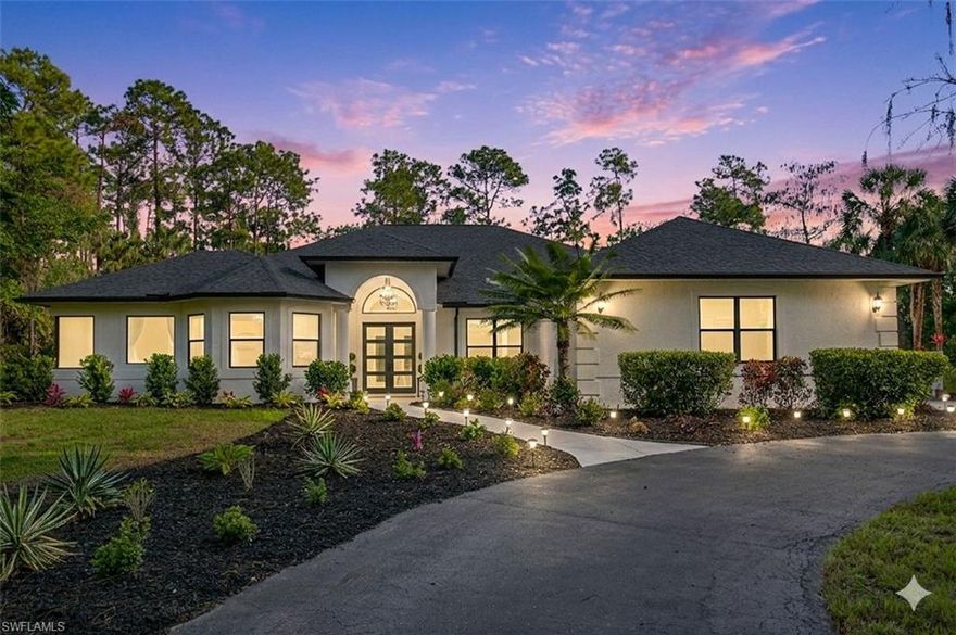 BETTER THAN NEW...2 HOMES...2.5 ACRE SQUARE LOT...NEW ROOFS, NEW IMPACT DOORS/WINDOWS, NEW A/C's, NEW SCREEN ENCLOSURE...NEW REVERSE OSMOSIS-both homes...NEW ELECTRIC FRONT GATE...NEW RENOVATION...6 CAR GARAGE...IMPECCABLE LANDSCAPING...AND THE LIST GOES ON AND ON!

Welcome to this Palatial Estate sprawling on 2.5 acres  (331' x 331') of lushing landscaped prime property, west of 951! A square lot gives more usable space and privacy over the long and narrow lots. The curb appeal does not stop as you enter through the new gate and take the winding freshly paved driveway through the lush landscaping to either of the 2 homes. Circular driveways to both homes and the out building in the back.
MAIN HOME: 
From the moment you walk into the main home through the stunning new impact glass doors an abundance of natural ight, the views of the sparkling pool, and outdoors surround you. The main home is 3721 sf under air with 5 spacious bedrooms sprawled out into 3 wings for the utmost in privacy. Three of the guest bedrooms have sliders out to a beautiful courtyard, while the Primary bedroom, complete with walk-in closets opens up to the screened pool area. Ensuite primary bath with dual sinks, separate walk-in shower, and soaker tub.
The 5th bedroom is located near the Primary and can be used as a bedroom, nursery, office, den, etc. 

A large CHEF'S KITCHEN with waterfall quartz counters, designer backsplash, plenty of white solid wood cabinetry, Viking gas stove, GE Profile wall oven, stainless appliances, large pantry, separate built-in desk, and long breakfast bar + breakfast room all opening up to the family room with a cozy fireplace. An additional formal dining room/entertaining rooms with wet bar & wine fridge all opening up to the spacious lanai make this the perfect home to entertain and enjoy your family. 
Luxury vinyl throughout the home complemented by new plumping/lighting fixtures, 2 bathrooms + two 1/2 baths.
Brand new impact sliders from Primary, Living, and Family Rooms to the spacious tiled lanai with refurbished pool/new equipment, brand new "picture" screened lanai with great outdoor views, a convenient 1/2 bath, Tiki Hut with gas grill hook-up & sink, plus an additional screened area with hot tub. Two additional bathrooms, an oversized 2 car garage with extra storage area complete this extraordinary Main Home.

GUEST HOME: 
1020 sq ft. under air with full kitchen, 1 bedroom (room for another bedroom upstairs), 1 + 1/2 bath, Great Room, screened lanai, new roof, new a/c, and a large 4 car garage with front & back tall garage doors and workshop, plus an additional storage building, also with garage door. Truly a multi-generational estate, perfect  for guests, parents, family, or renters! 
The combined sf = 4741 living area with 5985 total sf.
Sold furnished.  A+ Schools.
The possibilities are endless in this beautiful home.
Must be seen to be appreciated...priced below appraised value...FOR THE MOST DISCERNING BUYER!