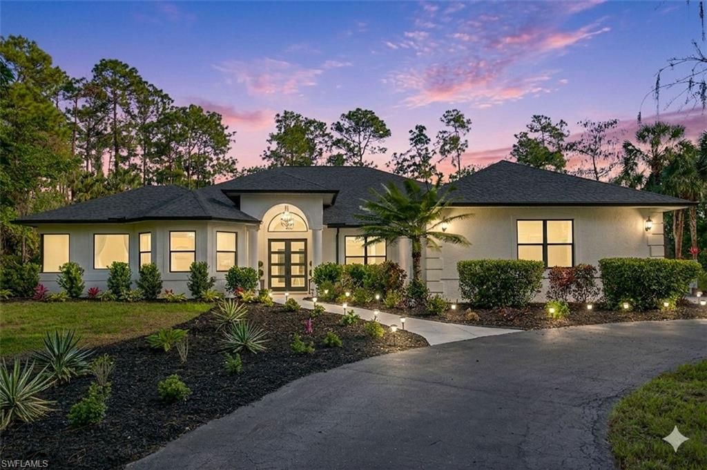 Photo of 4075 1st AVE SW, NAPLES, FL 34119 (MLS # 226011878)