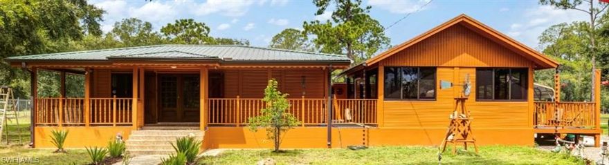 Exceptional 5-Acre Estate in Montura Ranches, FL – Endless Potential!
Don’t miss this rare opportunity to own a unique 5-acre estate in the desirable Montura Ranches community. Whether you're looking for a private residence, potential income-producing farm, or a future development opportunity, this property offers it all.
The original home is a well-built 2-bedroom, 2-bathroom residence crafted through-out with high-quality special imported Brazilian wood and original built, attached shutters for windows and doors. An attached Florida room with kitchen , extra laundry area, and an additional third half bathroom have been added, creating a versatile living space.
This fully fenced property features two separate gated entrances, dual access from two streets, and addressing on both sides—perfect for multi-use or future division. The lot includes 2 wells and 2 septic systems, making it ideal for farming, residential expansion, or potential commercial use.

Highlights include: agricultural use


Zoned for residential use but could possibly be rezoned as agricultural use.

Split the property for family housing — up to 4 lots (1.25 acres each).

Several mature fruit trees have that strong potential for a commercial farm or rental income.

Ideal setup for a Bed & Breakfast, with ample space for outdoor dining and recreation.

Can be subdivided into four 1.25-acre lots, each buildable.

Excellent long-term appreciation in a fast-growing area.

One vacant lot is already equipped with its own well and septic.

Frontage on Cabbage Palm Street faces a peaceful preserve—no future development across the street.

With its flexible layout, abundant space, and strategic location, this property is perfect for investors, homesteaders, or anyone seeking privacy with potential. Schedule your tour today!