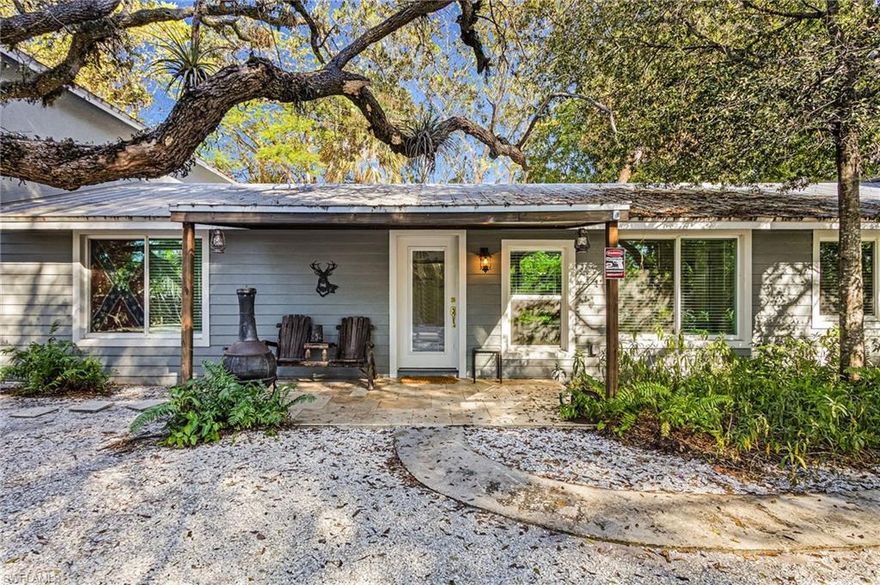 Welcome to a home that truly stands out. This 3-bedroom, 2-bath residence offers approximately 1,600 square feet under air plus a versatile den, all situated on a rare double lot providing exceptional space and privacy.

Enjoy outdoor living with a large screened-in lanai featuring an outdoor fireplace, perfect for relaxing or entertaining, along with a fully fenced yard. What truly sets this property apart is its outstanding parking and storage: an oversized garage accommodating up to six vehicles or a boat or RV with additional vehicles, plus loft storage, and an expansive carport suitable for multiple vehicles, a truck and trailer, or even a semi-truck.

With approximately 2,700 square feet total, this property combines comfort and functionality and is ideally located just minutes from the beach, nearby boat docks, and popular dining destinations.